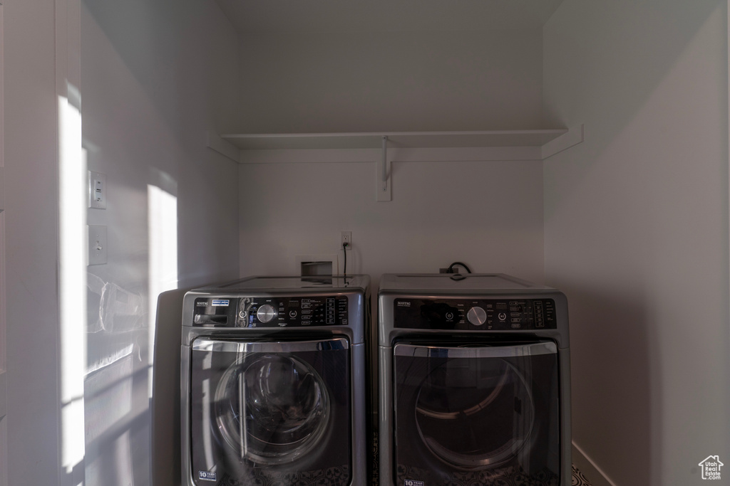 Washroom featuring separate washer and dryer