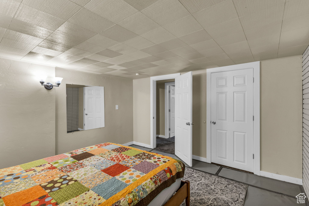 Bedroom featuring baseboards