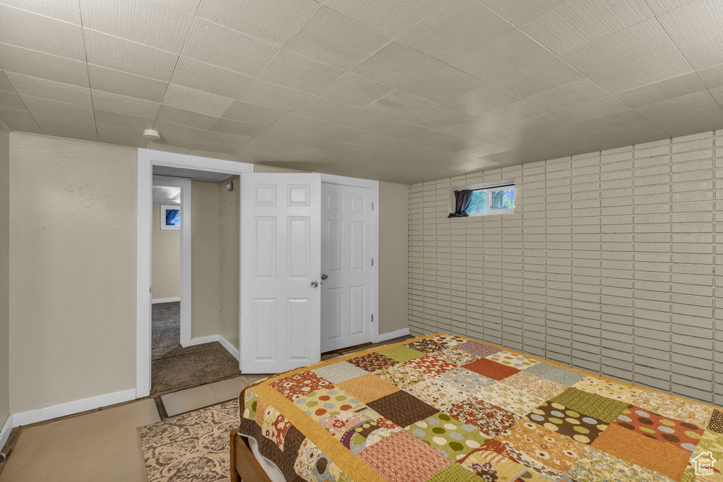 Bedroom featuring baseboards