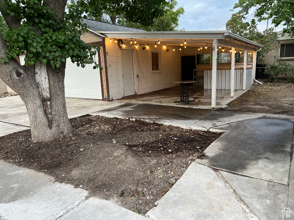 Exterior space featuring roof with shingles