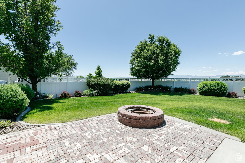 View of patio / terrace featuring a fire pit