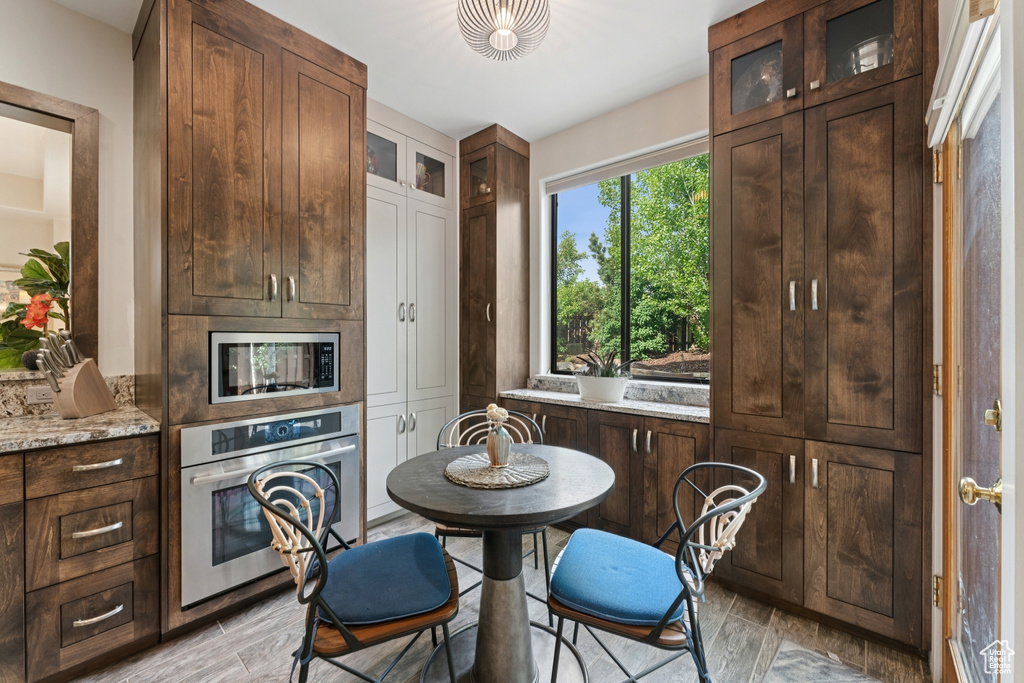Dining room with light wood-style floors