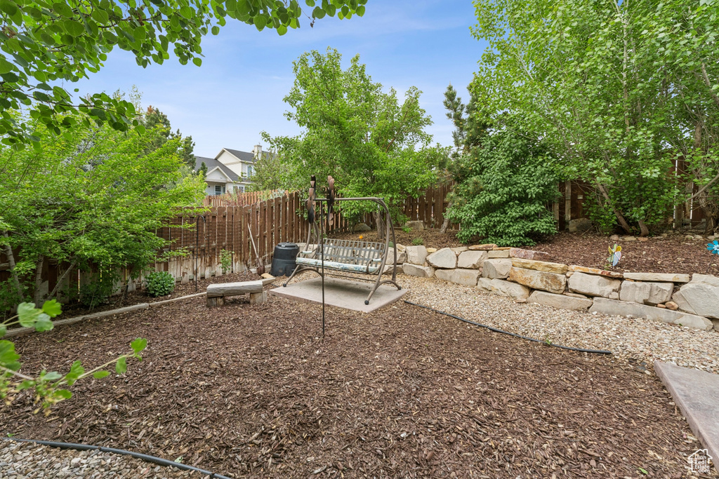 View of fenced backyard