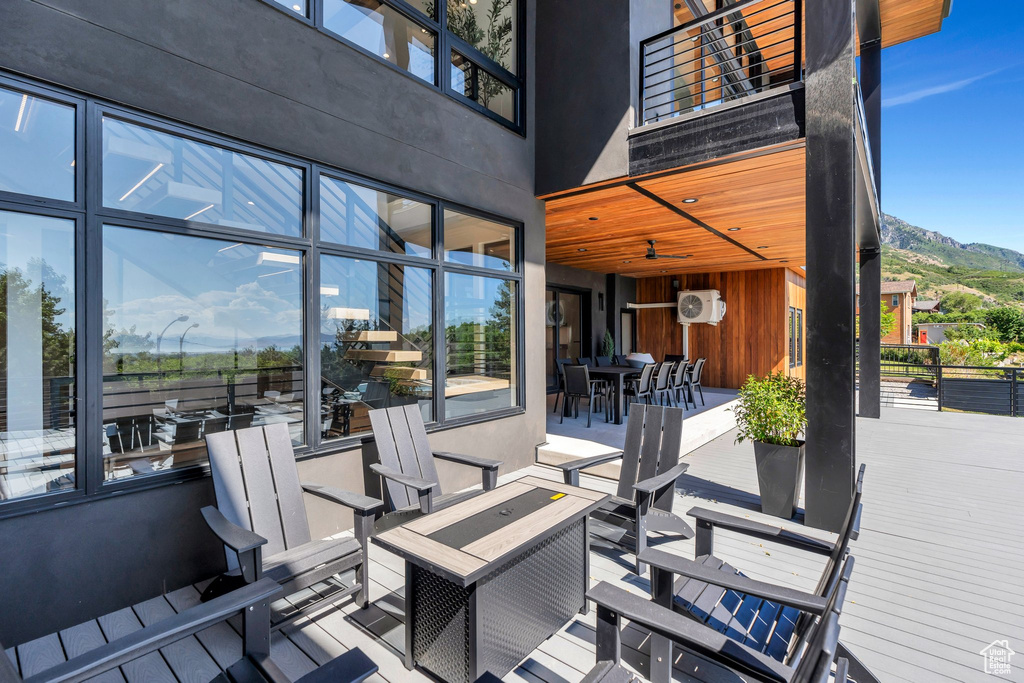 View of patio featuring a mountain view and outdoor dining area