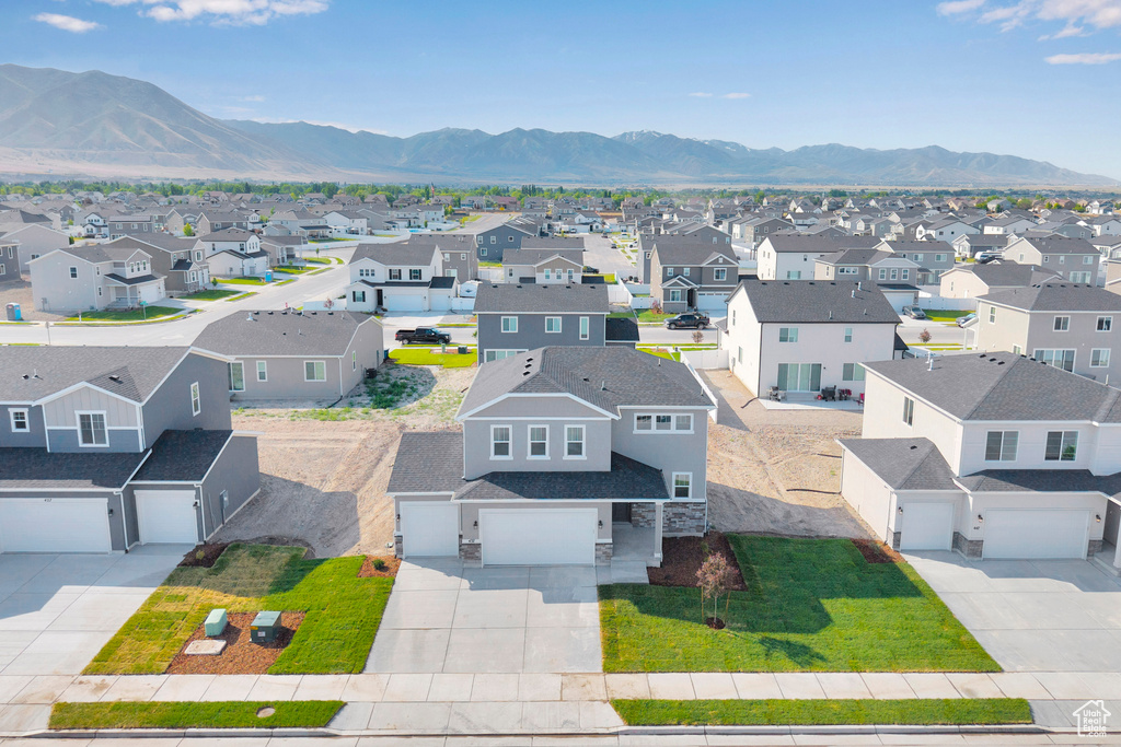Aerial perspective of suburban area featuring mountains