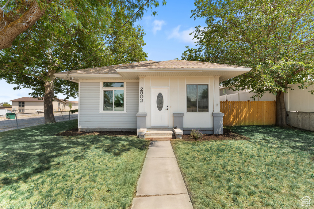 Bungalow with a shingled roof