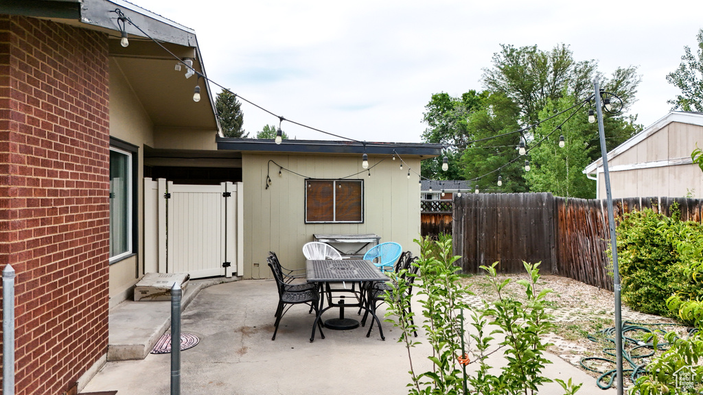 Fenced backyard with a patio area