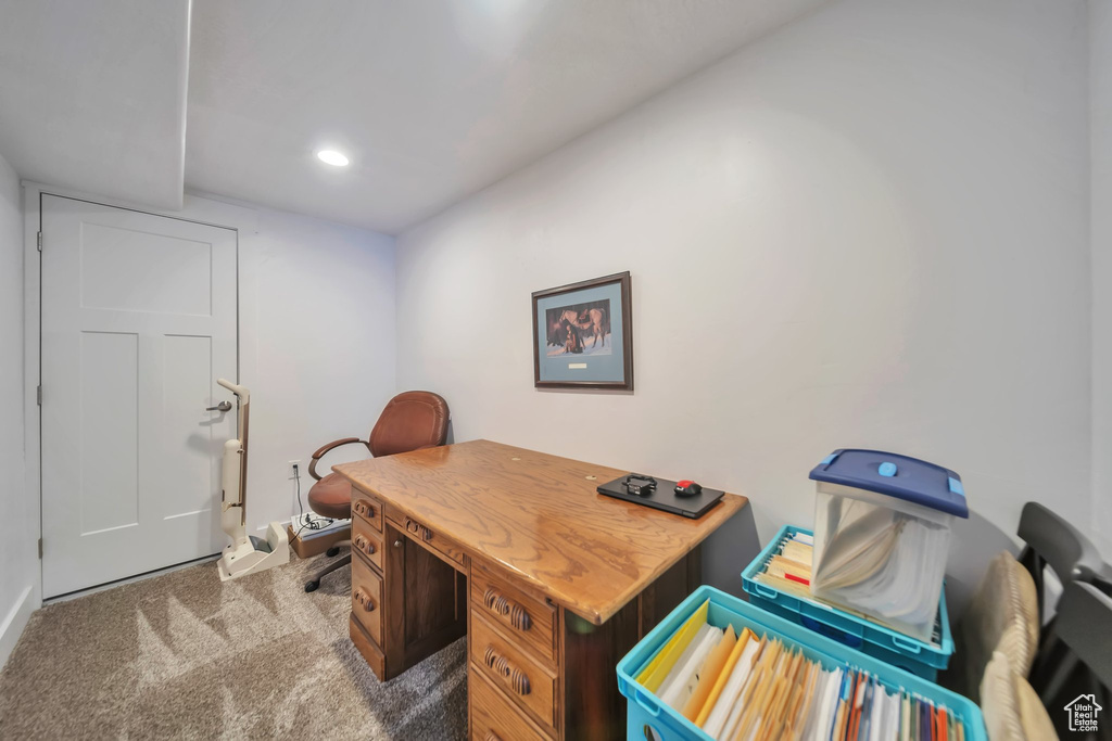 Office space with carpet flooring and recessed lighting