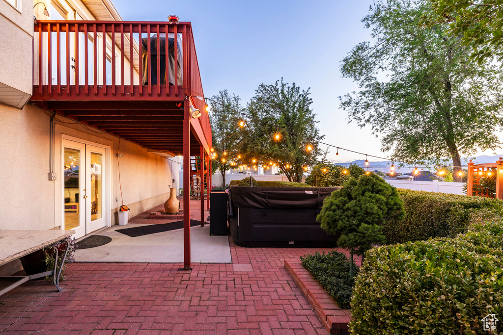 View of patio featuring a hot tub