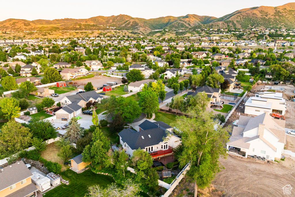 Aerial view of residential area with mountains