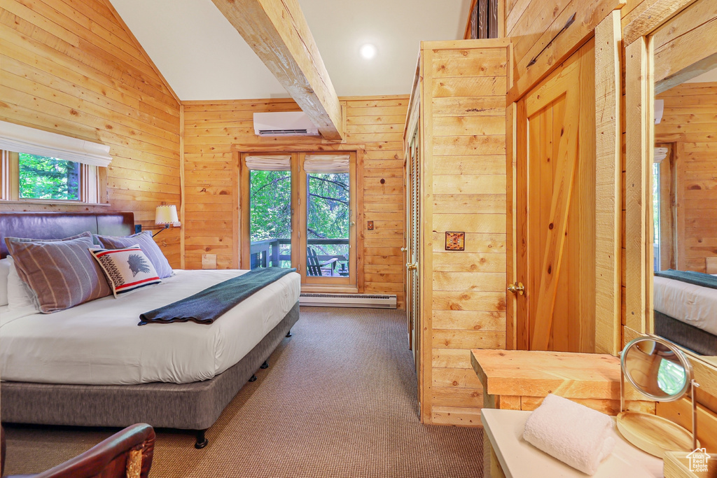 Carpeted bedroom with wood walls, multiple windows, a baseboard radiator, lofted ceiling, and a wall mounted air conditioner