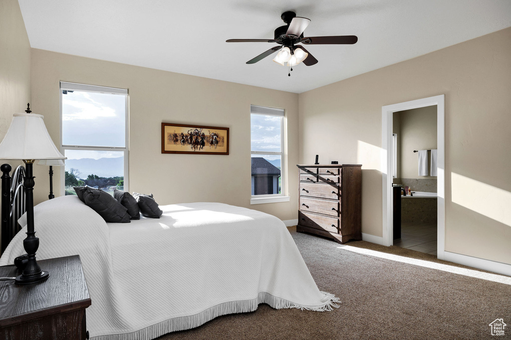 Bedroom with carpet flooring and ceiling fan