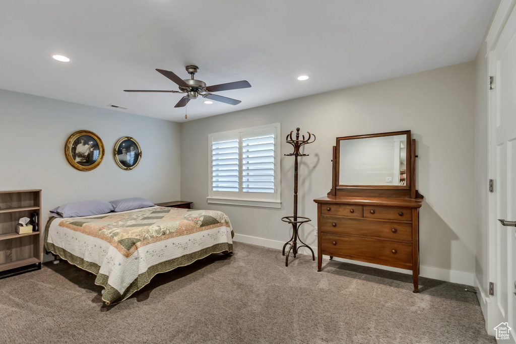 Bedroom featuring carpet flooring, baseboards, recessed lighting, and ceiling fan