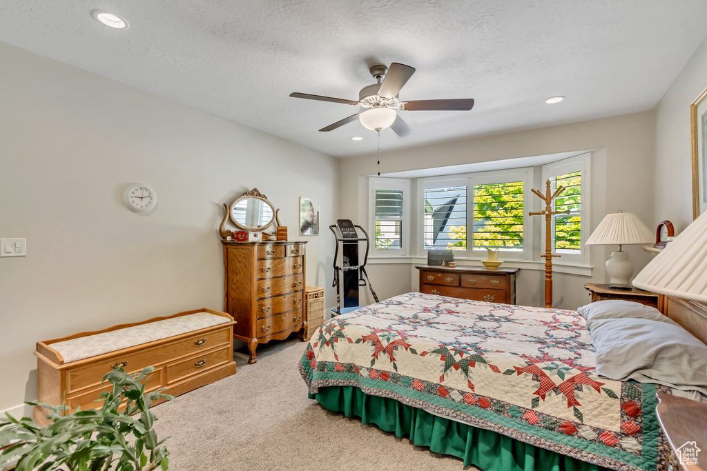 Bedroom featuring carpet, recessed lighting, and ceiling fan