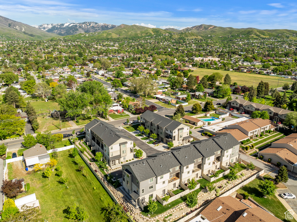 Aerial view of residential area with a mountain backdrop