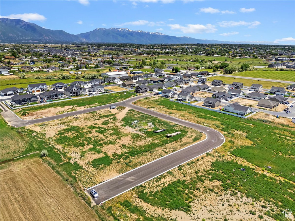 Aerial view of residential area with mountains