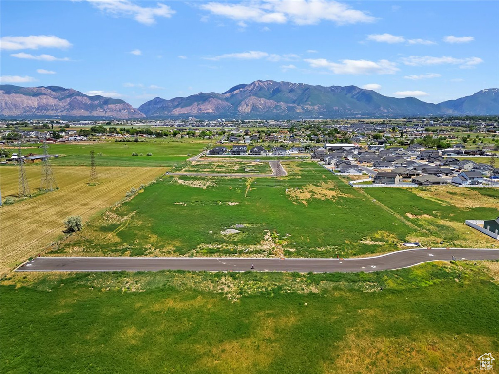 Aerial view of residential area with a mountainous background