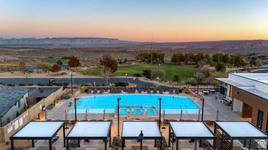 Community pool featuring a mountain view