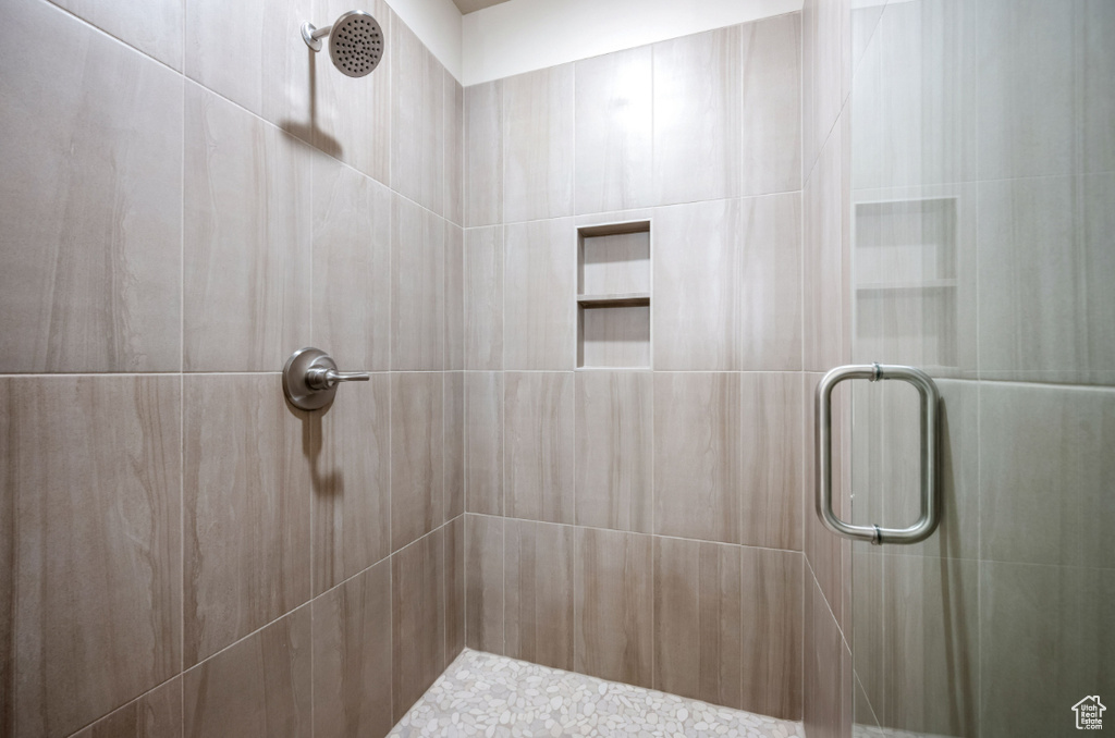Full bath featuring a stall shower