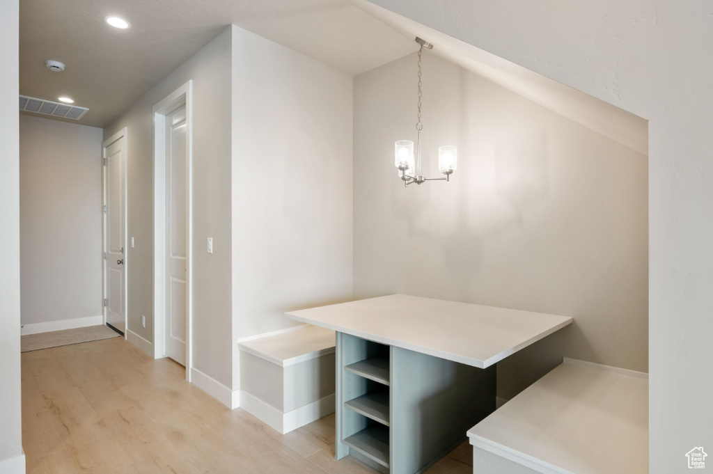 Mudroom featuring light wood-type flooring, a chandelier, recessed lighting, and baseboards