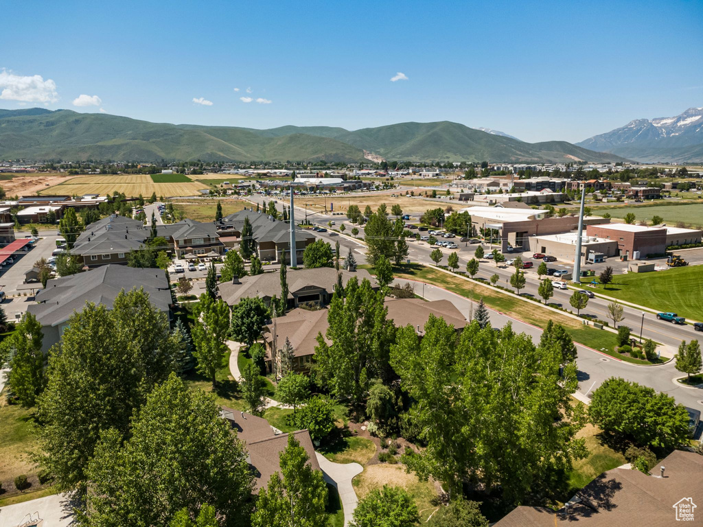 Aerial view of residential area featuring a mountain backdrop