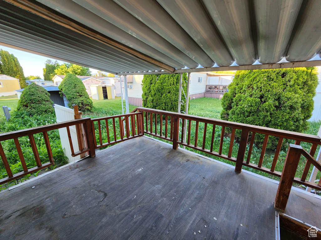 Wooden deck with a lawn
