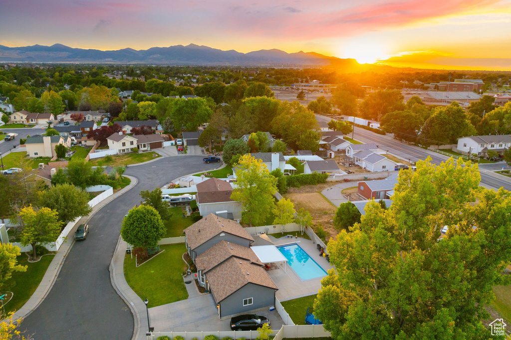 Aerial view at dusk of a mountain view and a residential view