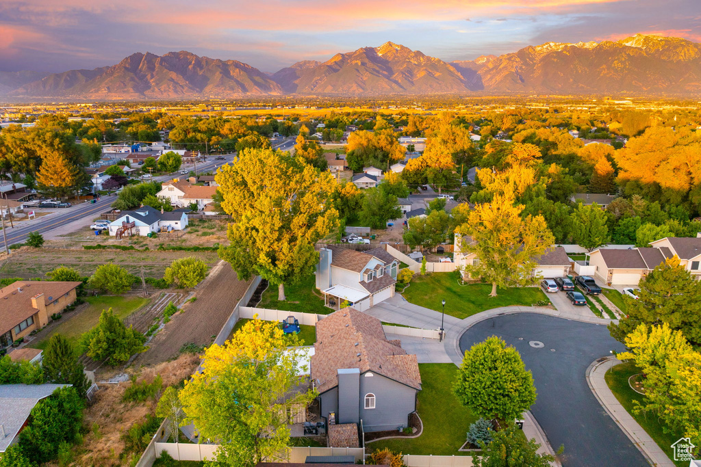 Aerial view at dusk of a mountain view and a residential view