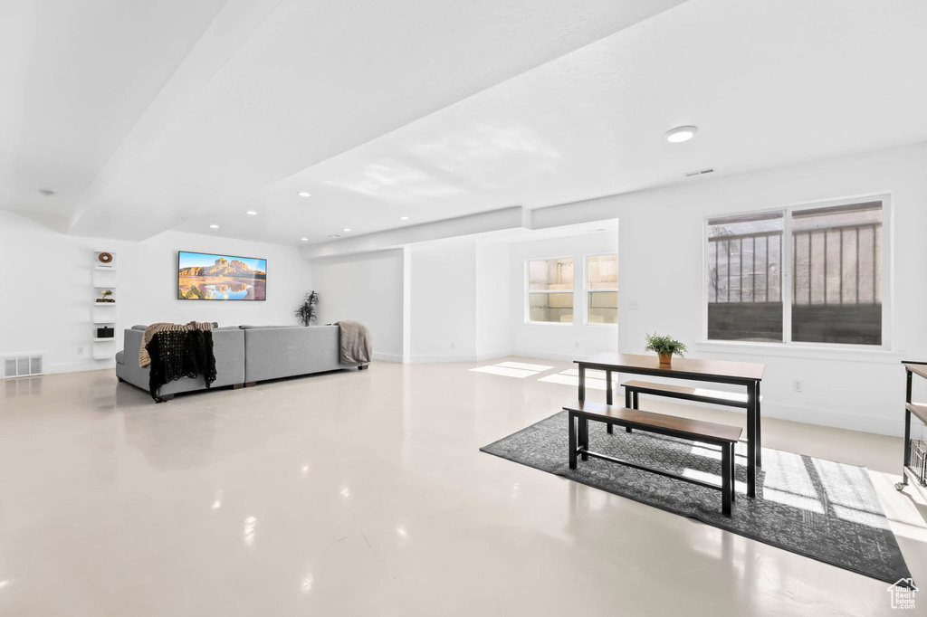 Living area featuring recessed lighting and baseboards