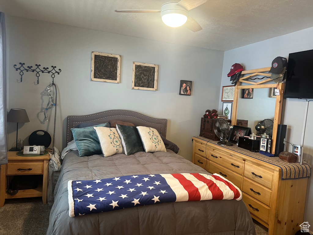 Bedroom with carpet floors and ceiling fan