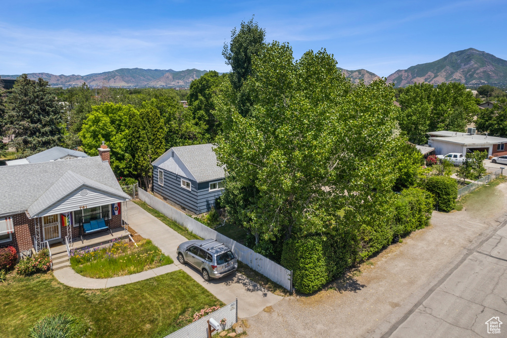 View of subject property with mountains