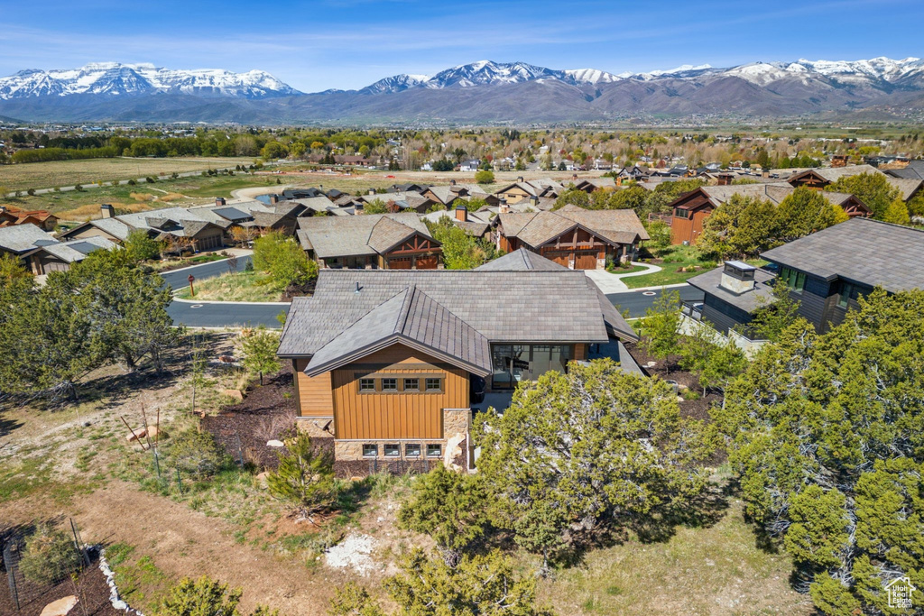 Aerial perspective of suburban area featuring mountains