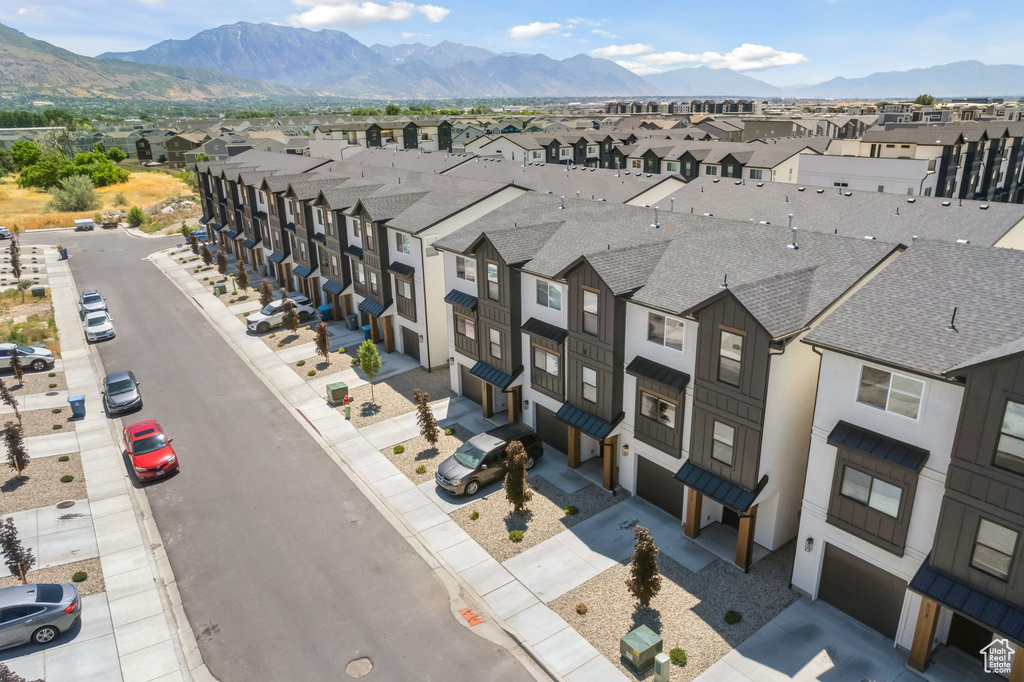 Aerial view of residential area with mountains