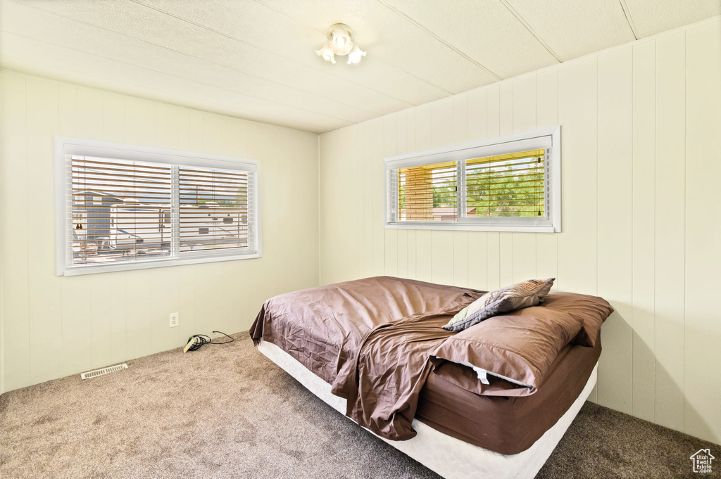 Bedroom featuring carpet flooring
