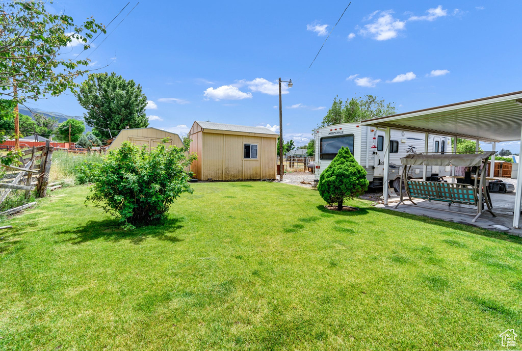 View of yard with a patio