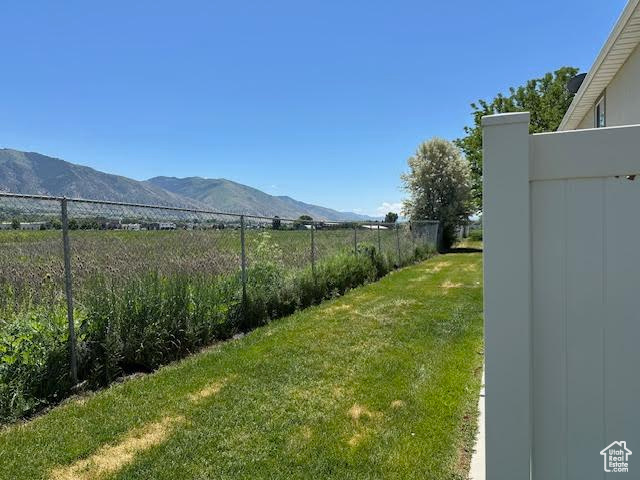 View of yard featuring a mountain view
