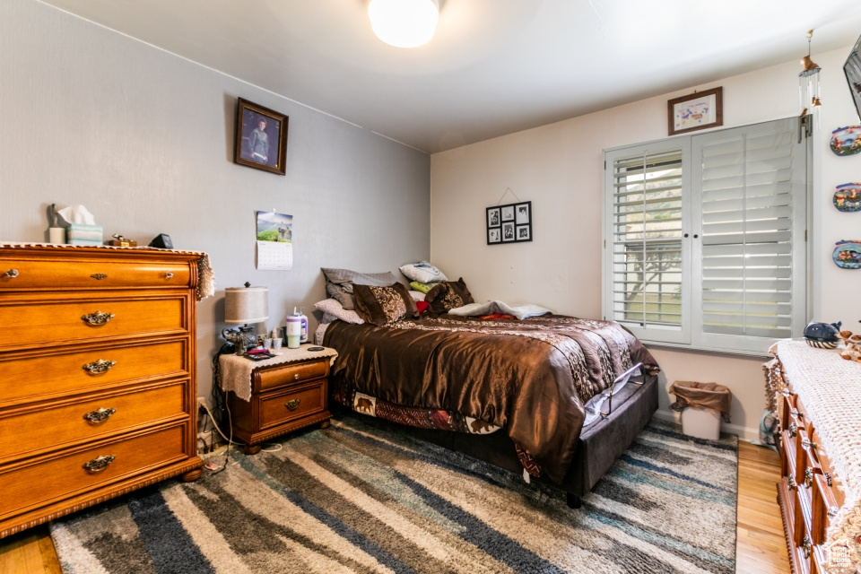 Bedroom featuring wood finished floors