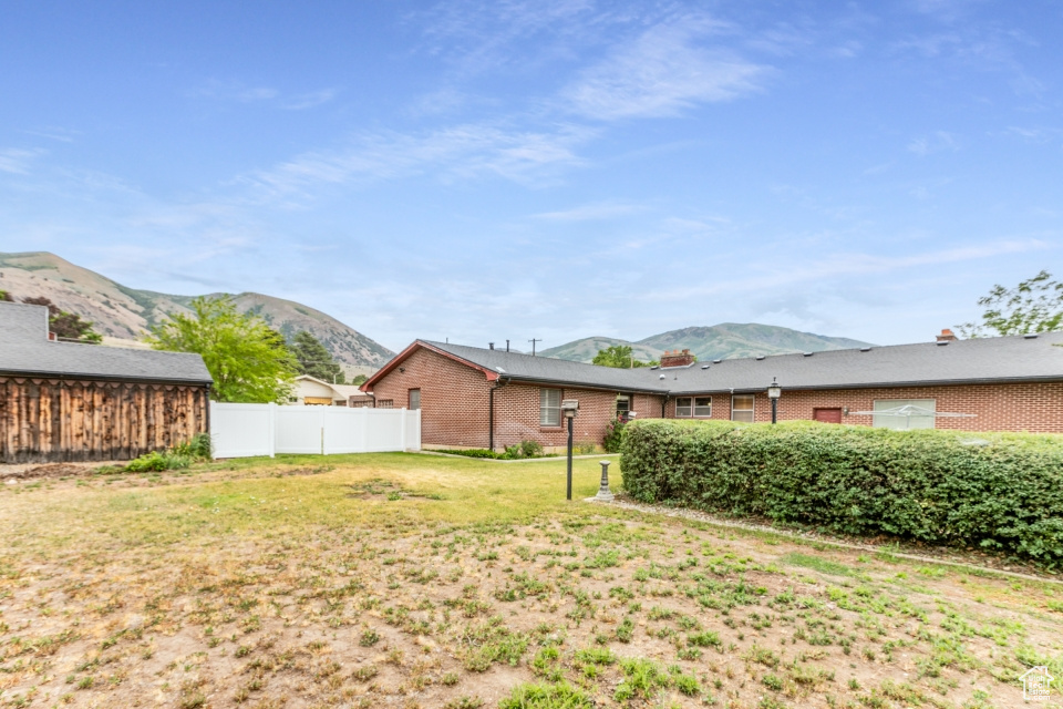 View of yard featuring a mountain view