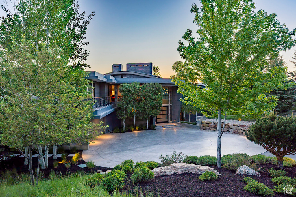 View of front of house with a patio area