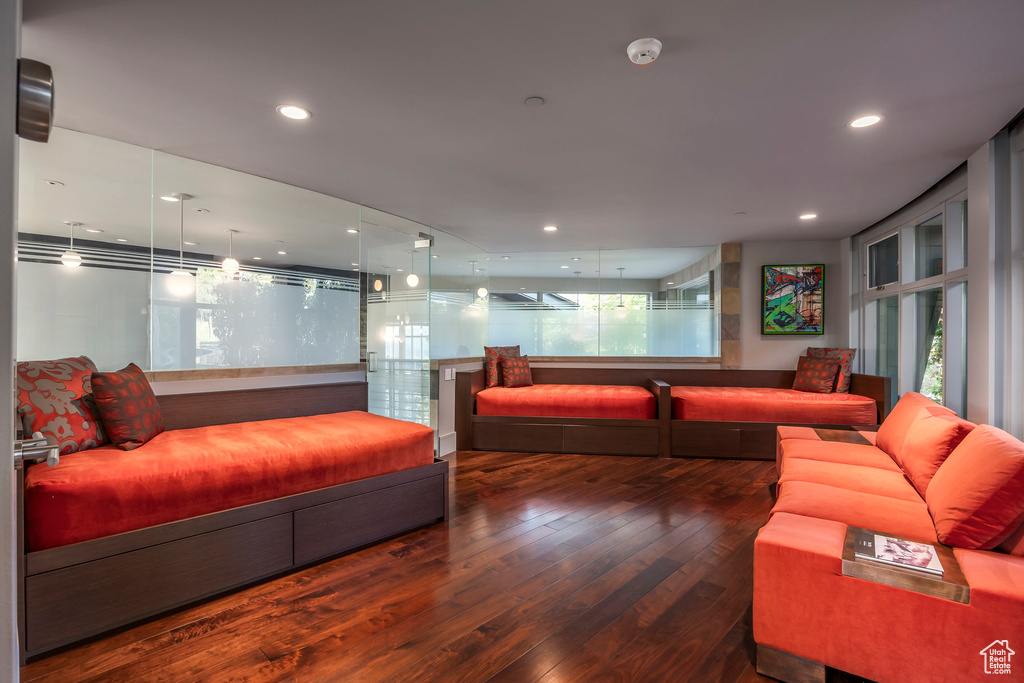 Living area featuring wood-type flooring and recessed lighting
