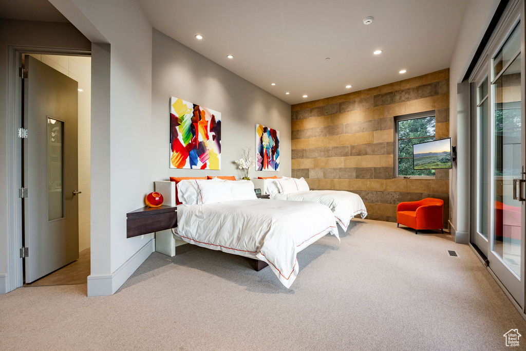 Carpeted bedroom featuring recessed lighting and baseboards