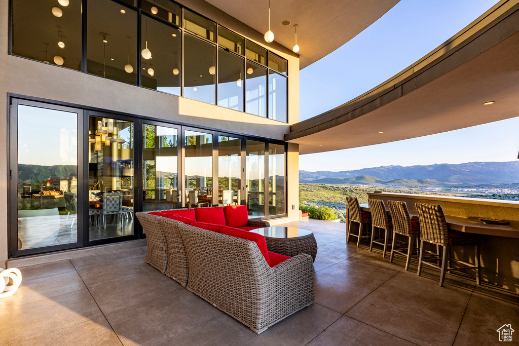 Lobby with a mountain view and a towering ceiling