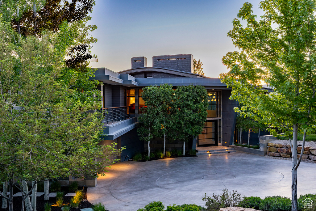 Contemporary home featuring a balcony