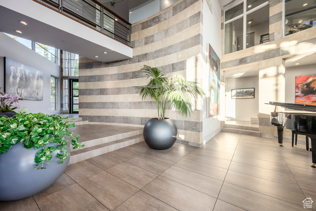 Lobby featuring a towering ceiling