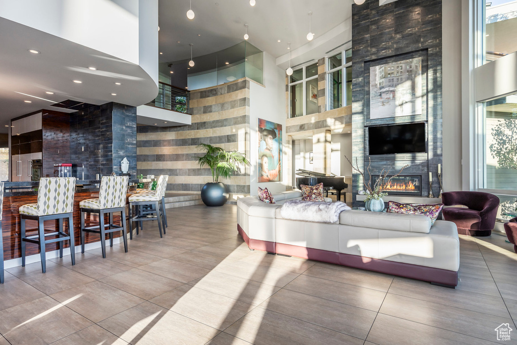 Building lobby featuring a high ceiling and recessed lighting