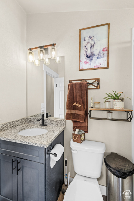 Bathroom with vanity and toilet