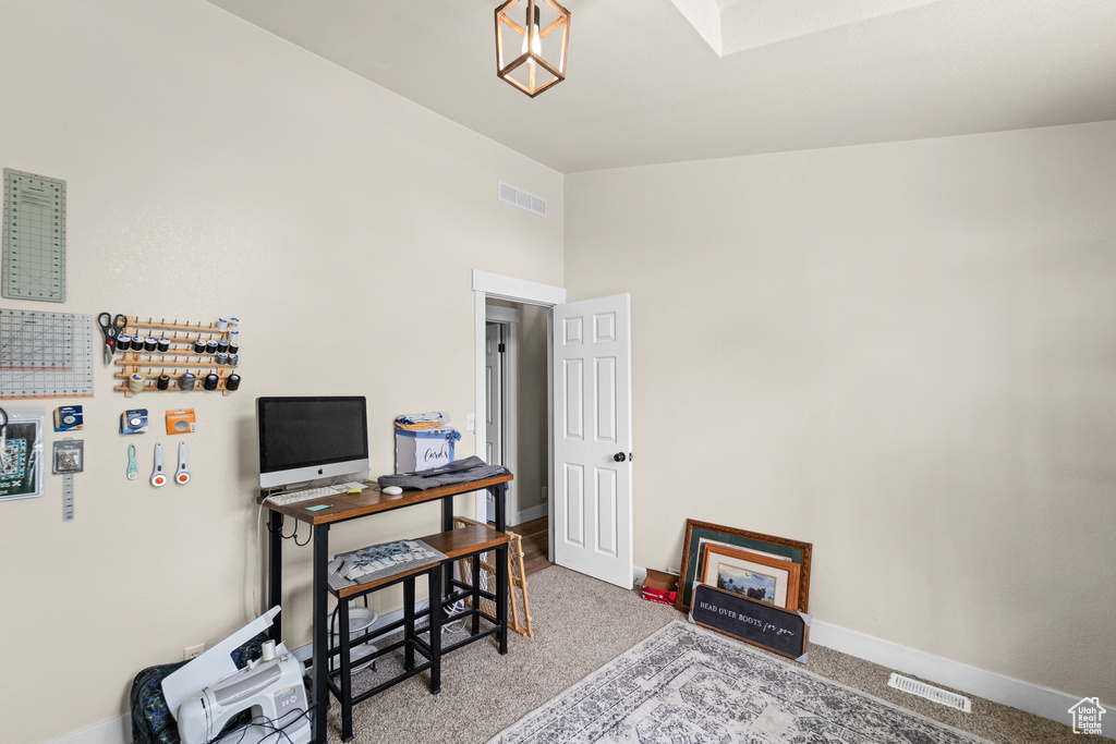 Office area with carpet and baseboards