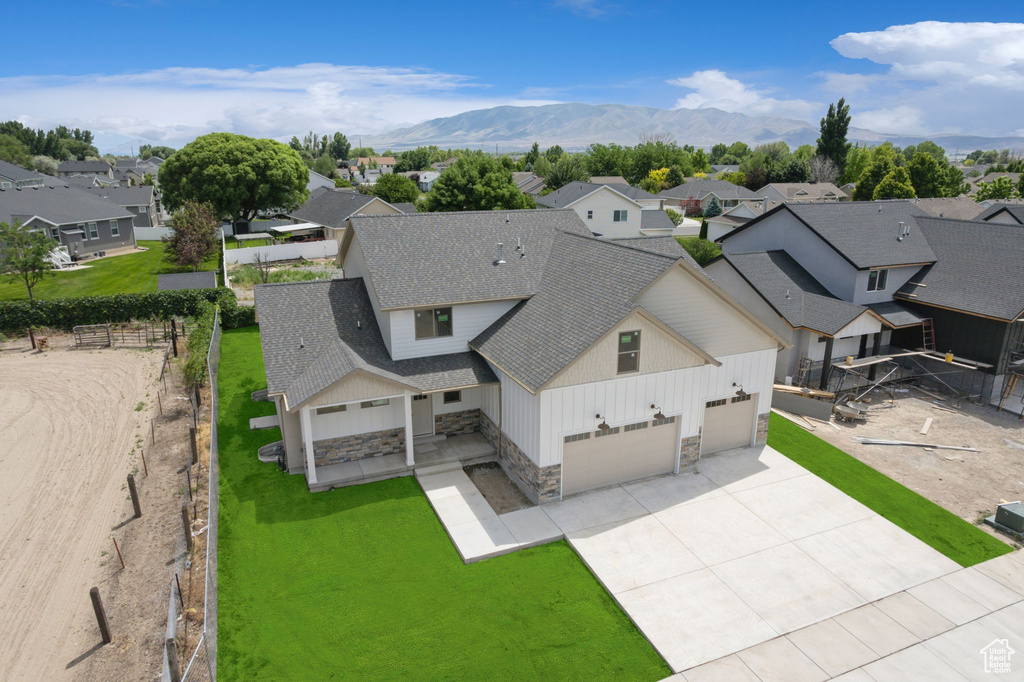 Aerial view of residential area with mountains
