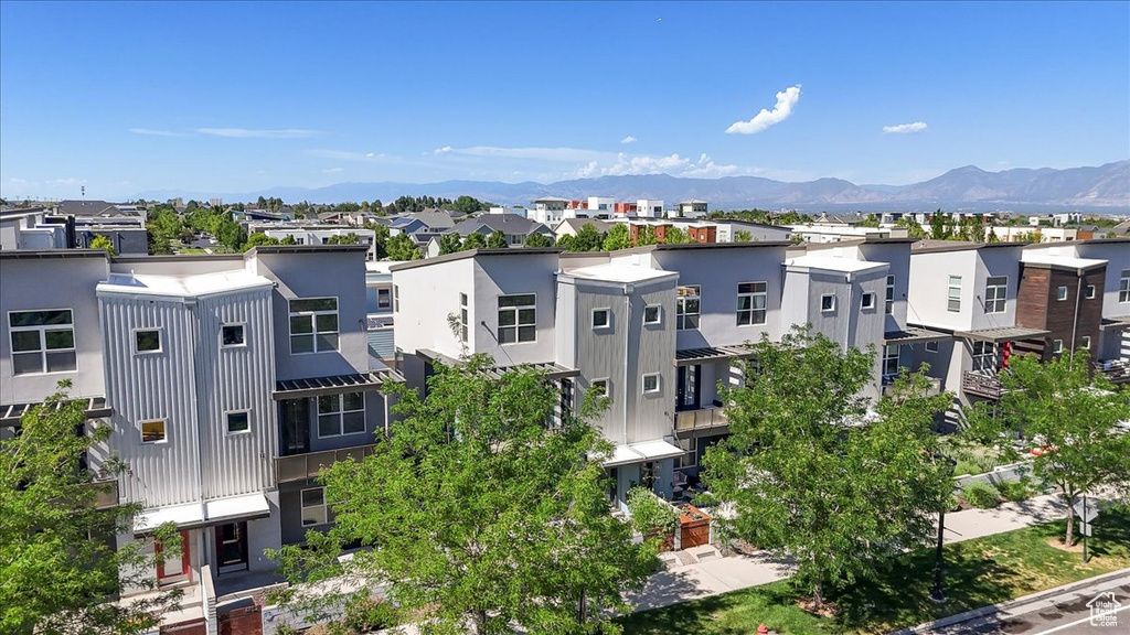 Aerial view of residential area with a mountain backdrop