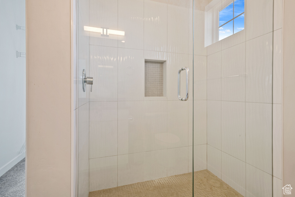 Full bath with a shower stall